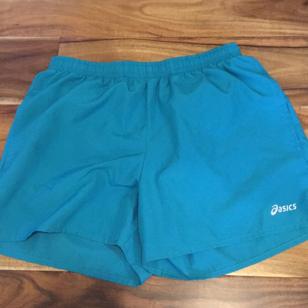 asics athletic turquoise shorts with pockets